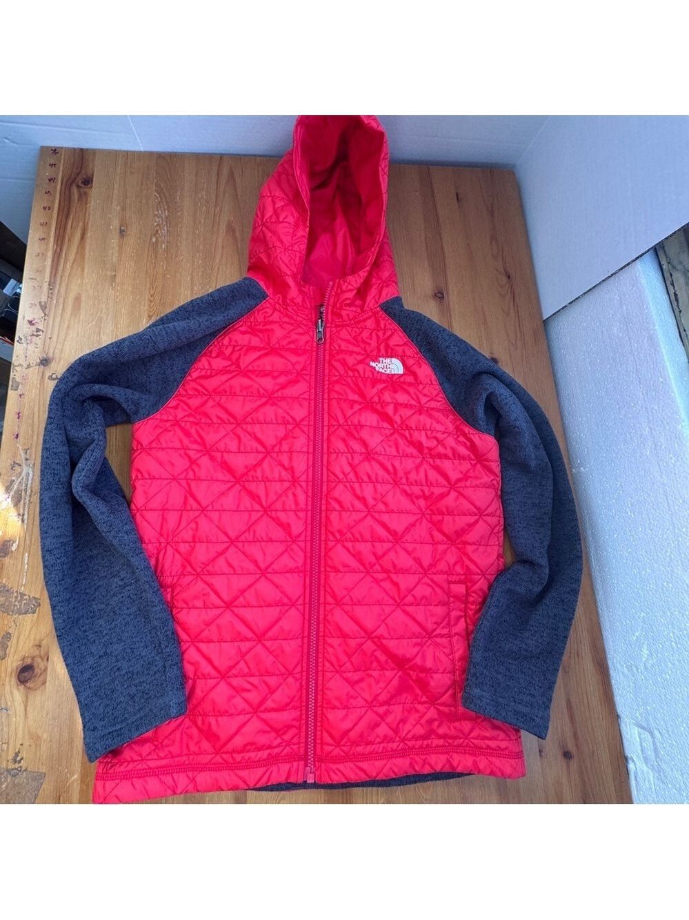 The North Face Kids Red hooded jacket size 14/16